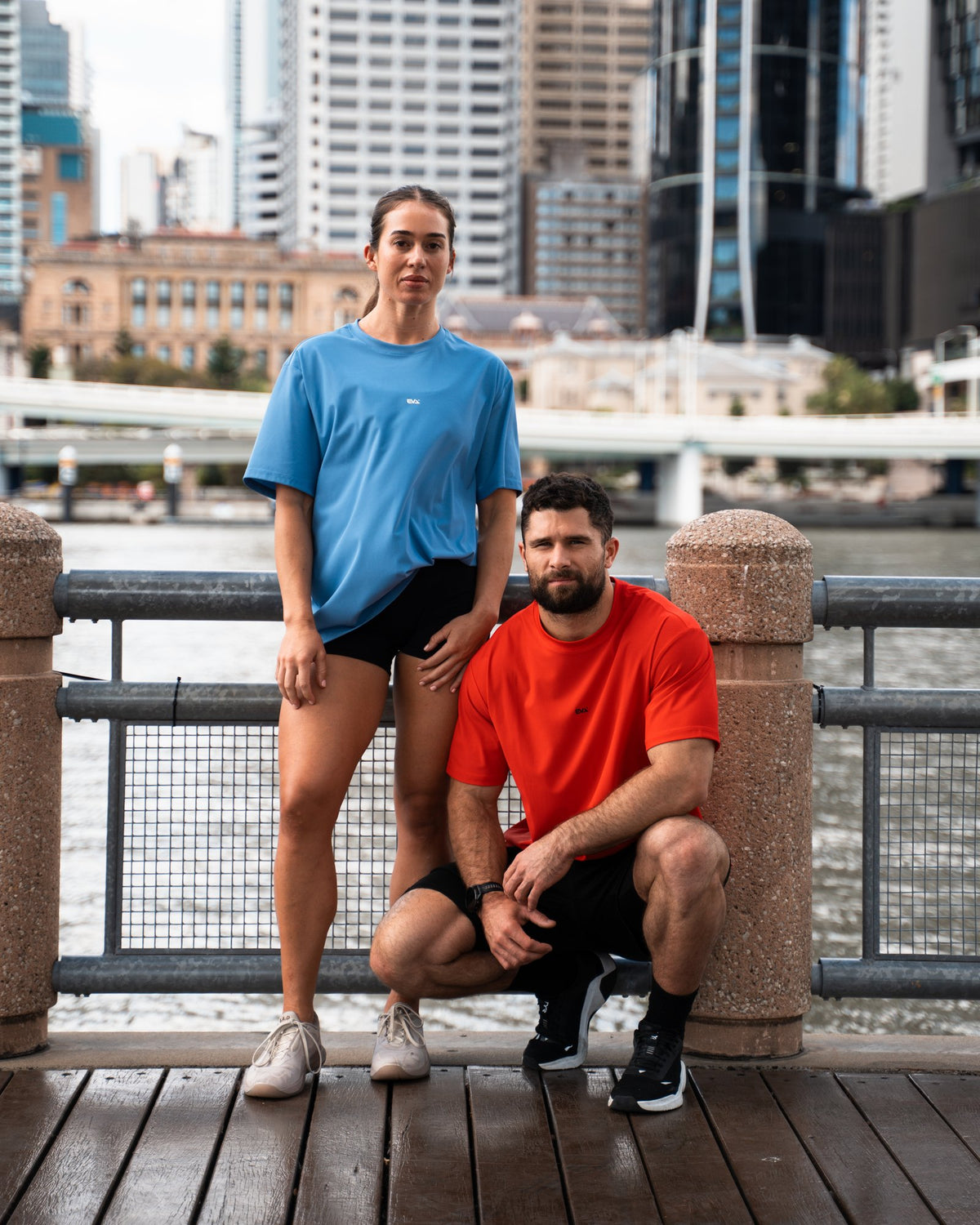 Legacy Oversize Tee in Core Blue - female model by the river