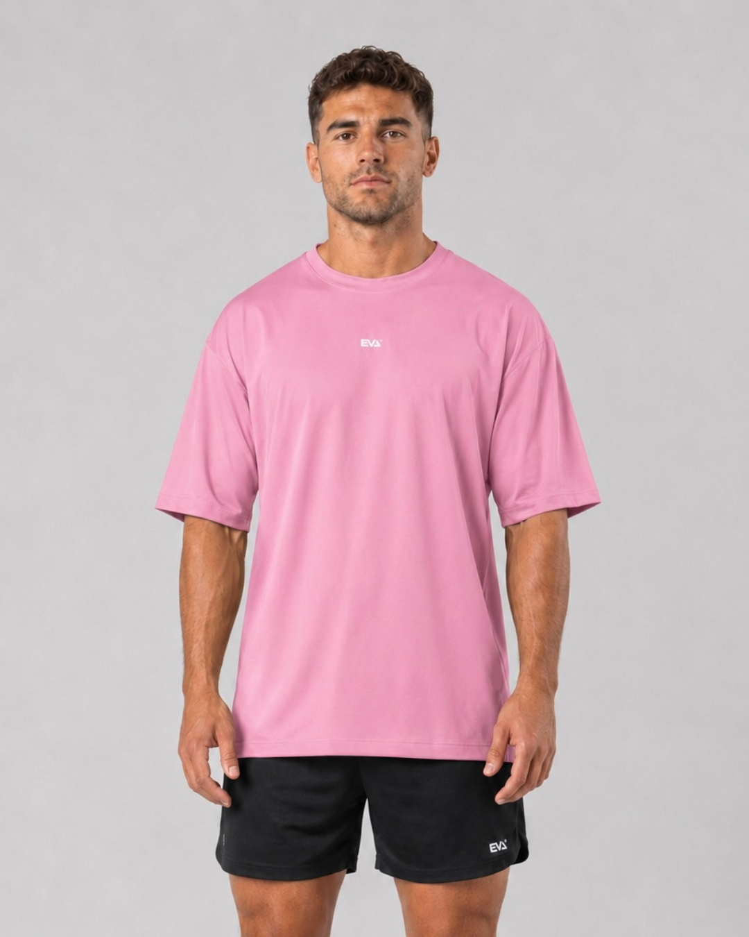 Legacy Oversize Tee in Powder Pink - front view on male model