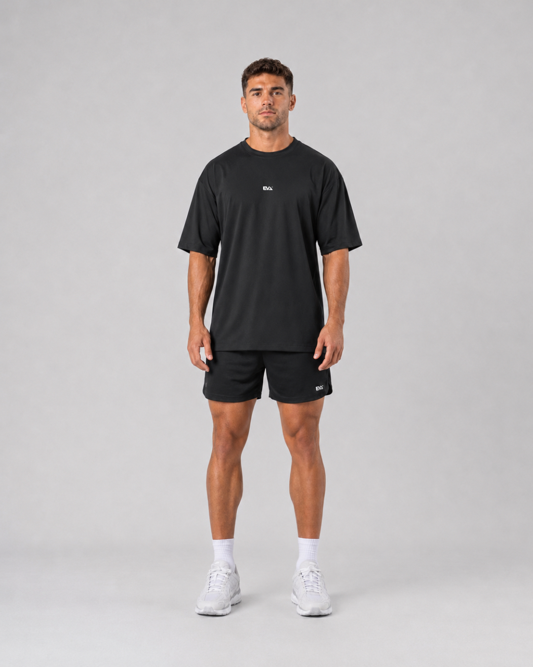 Legacy Oversize Tee in Black - front view on male model