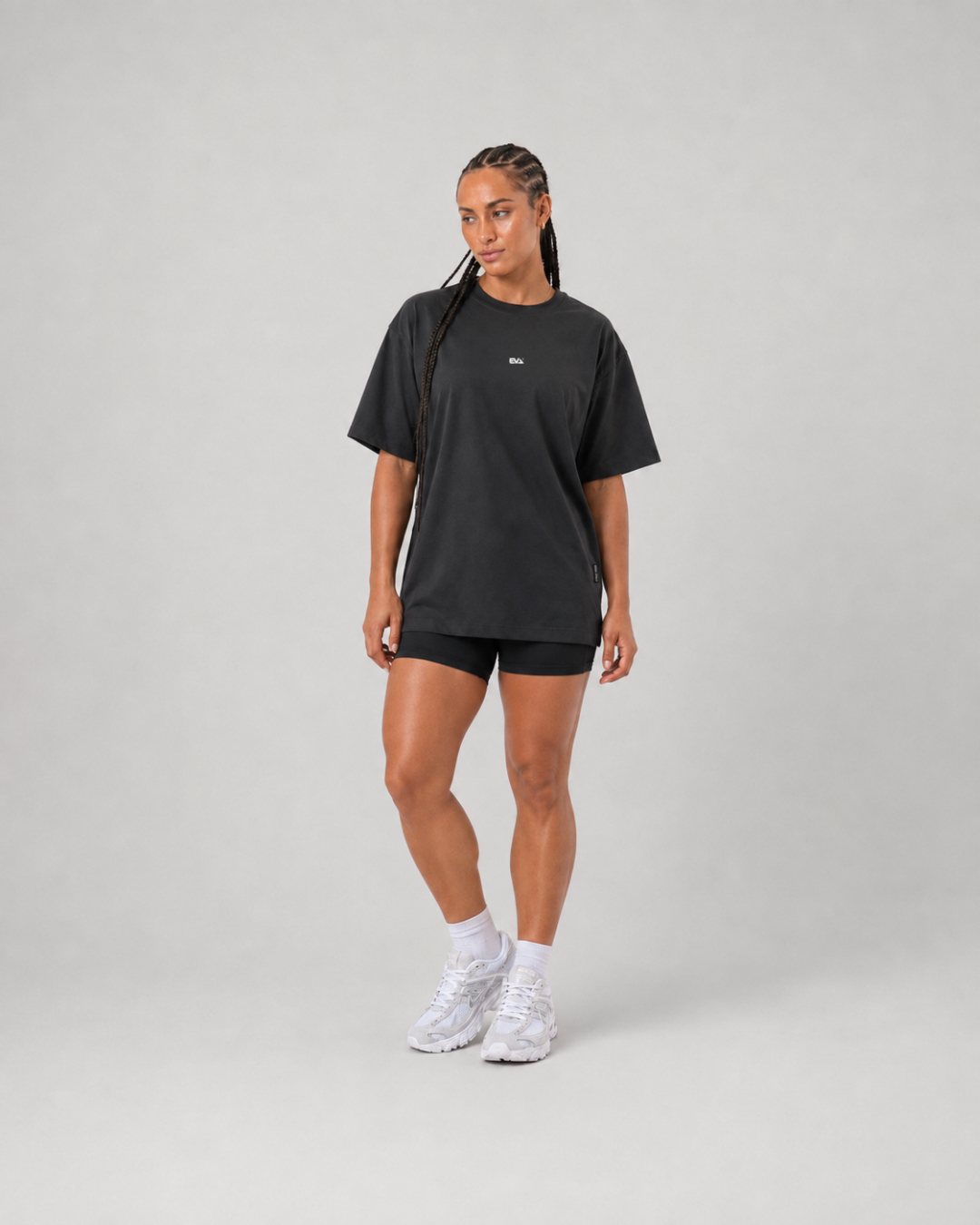 Legacy Oversize Tee in Black - front view on female model