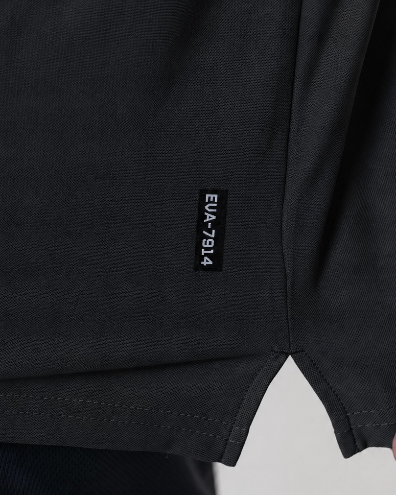 Legacy Oversize Tee in Black - fabric and EVA-7914 hem tab detail