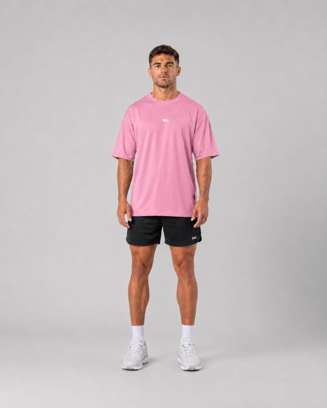 Legacy Oversize Tee in Powder Pink - front view on male model