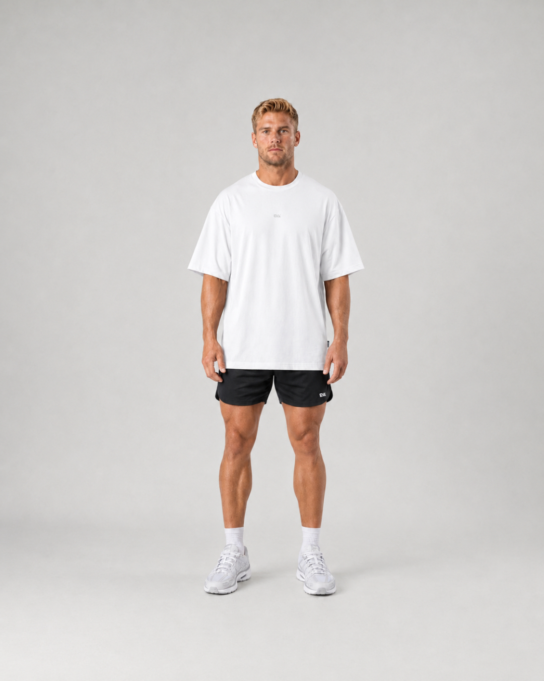 Legacy Oversize Tee in White - front view on male model