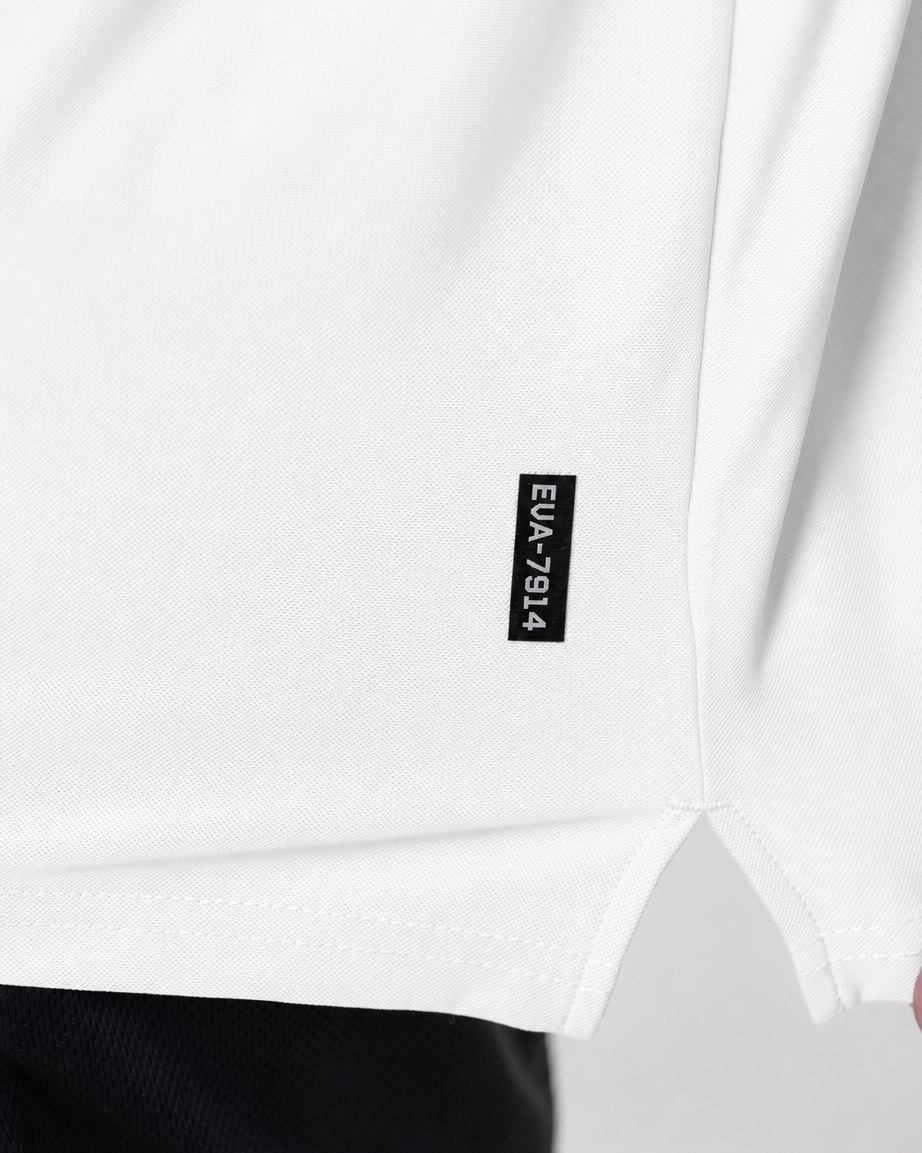 Legacy Oversize Tee in White - fabric and EVA-7914 hem tab detail